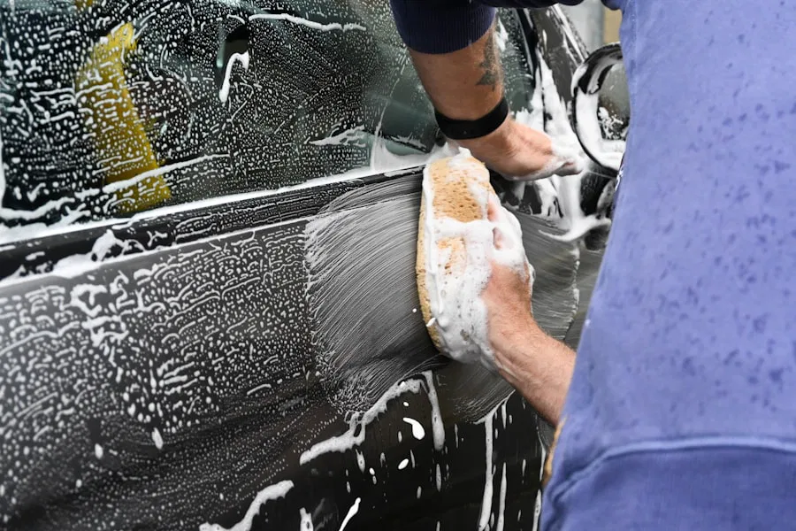 Person washing a car