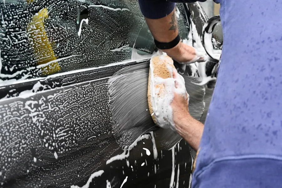 Person washing a car